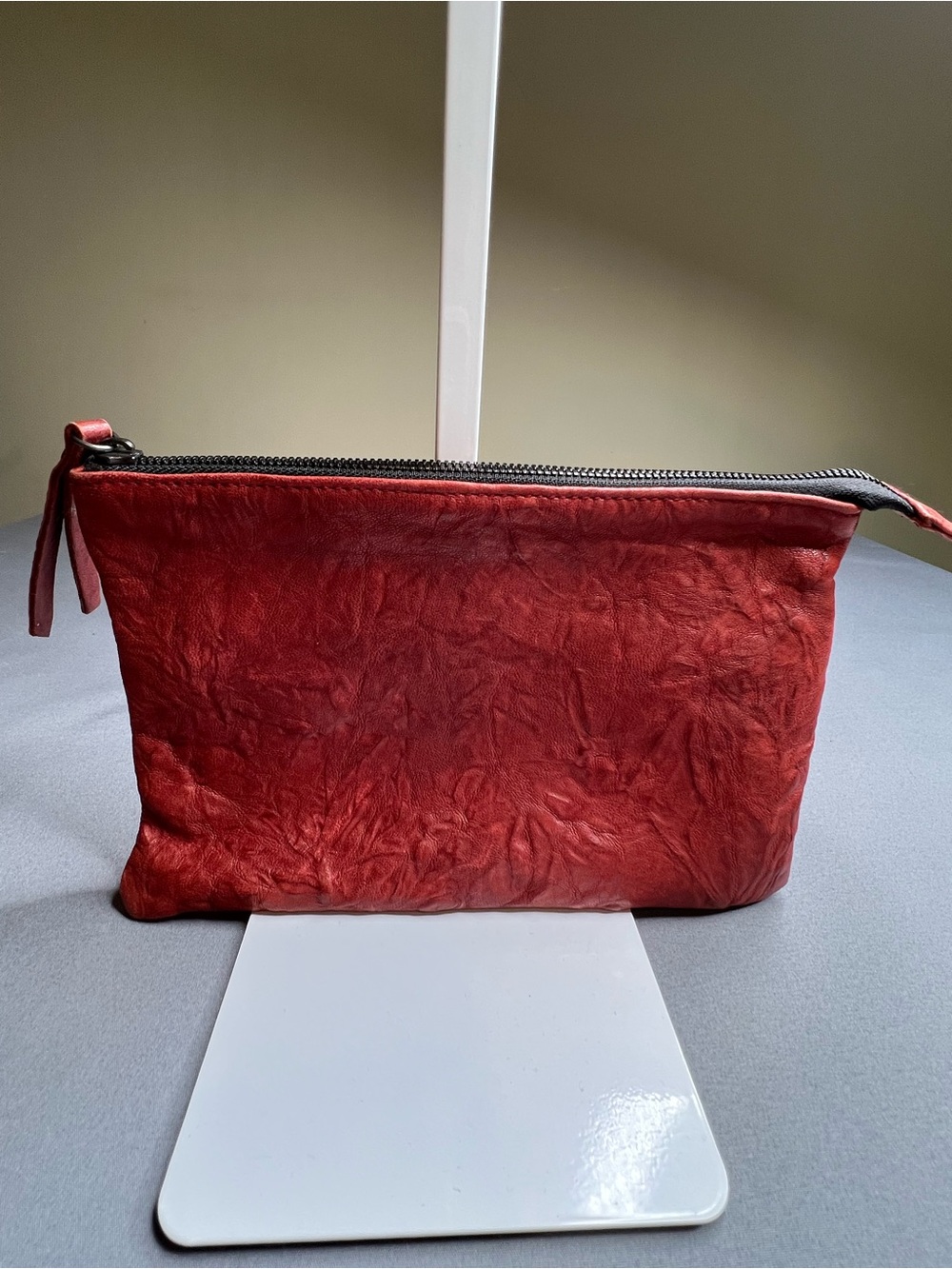 Genuine Leather Oxblood Red Zipper Pouch Clutch | Essex Los Angeles Pull Tag
